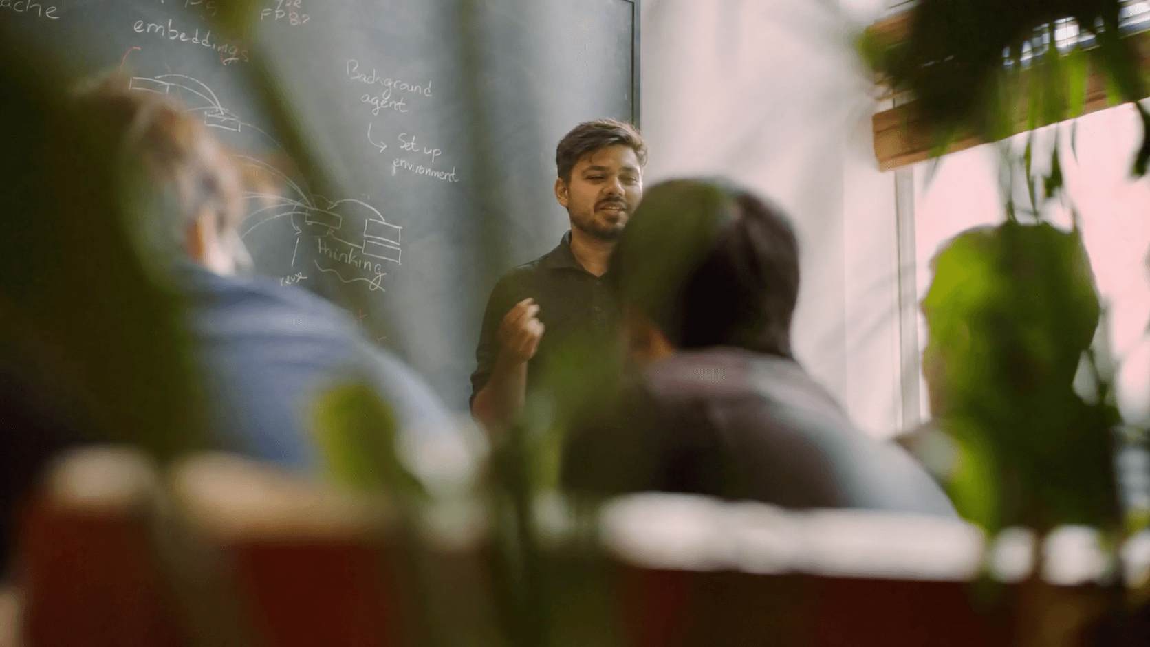 Syed presenting an agent workflow during a working session